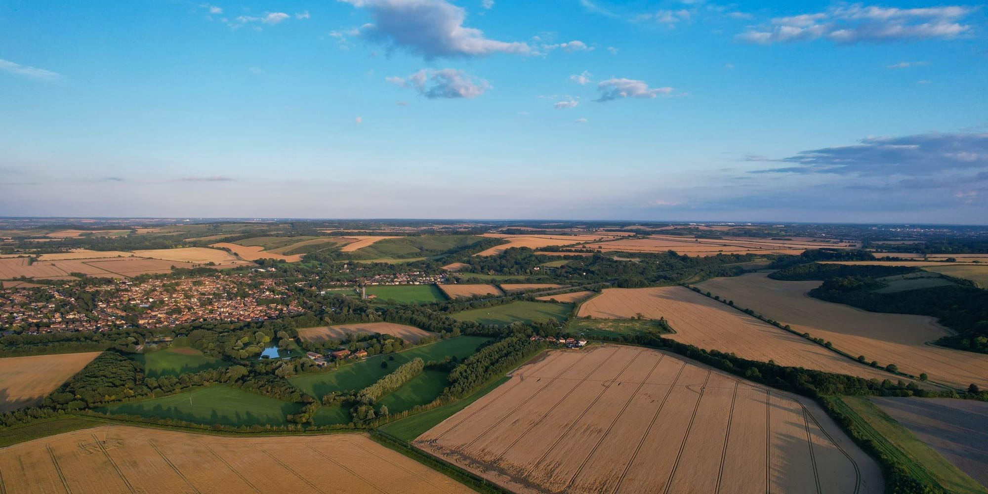 Aerial view of English farmland and villages around Aylesbury