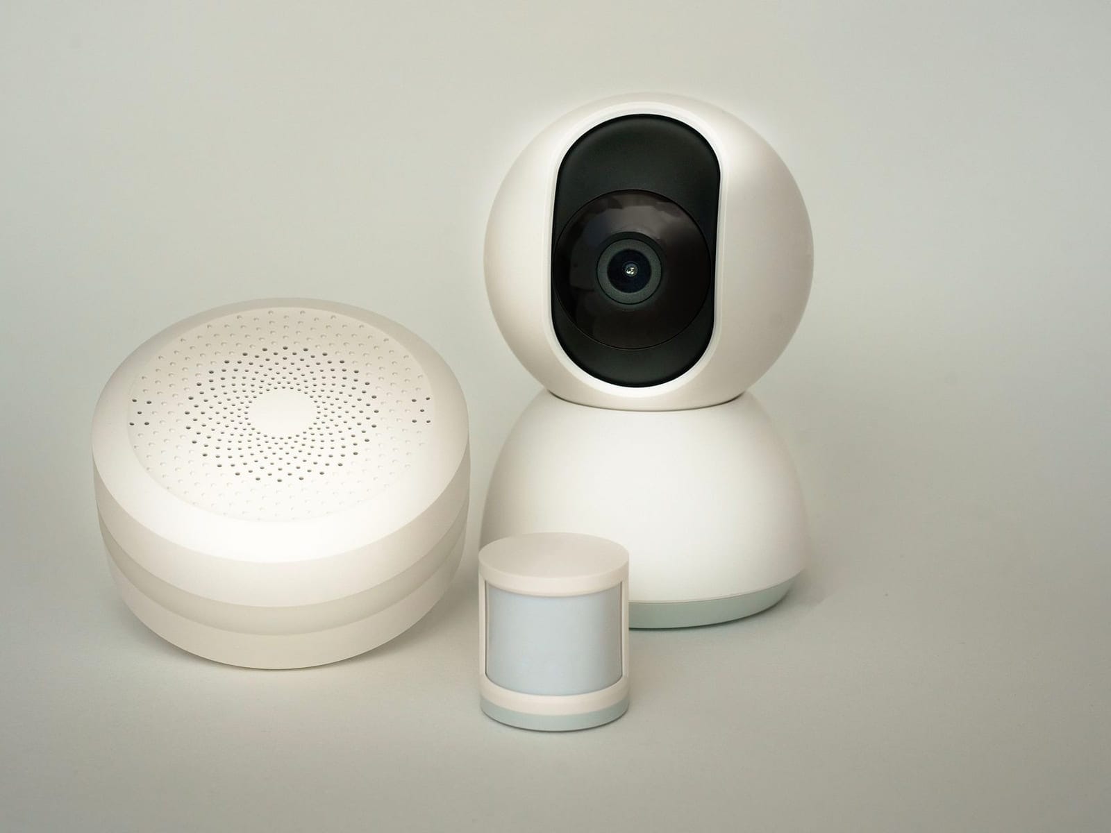 Security operator reviewing live camera feeds across multiple monitors